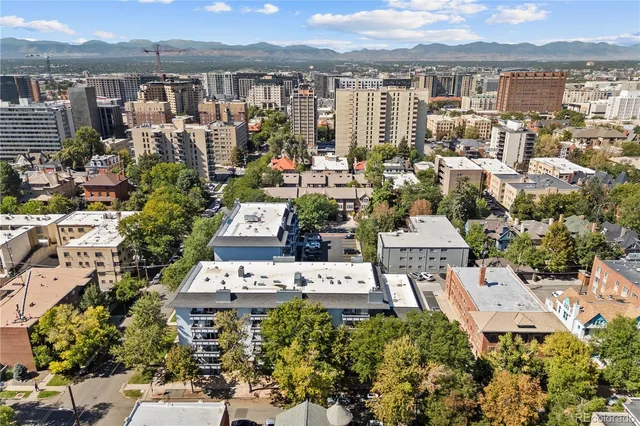 a view of city with ocean