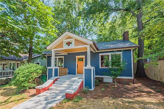 2116 Rozzelles Ferry Road Charlotte, NC 28208 - Photo 1 of 24 a front view of a house with garden