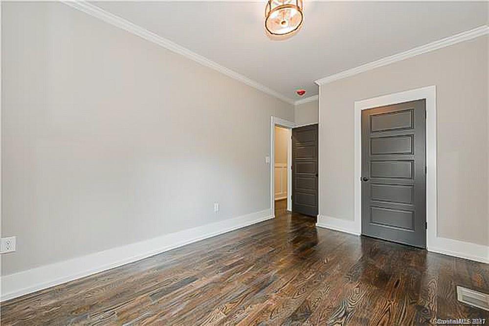 2116 Rozzelles Ferry Road Charlotte, NC 28208 - Photo 19 of 24 a view of an empty room with closet and a window