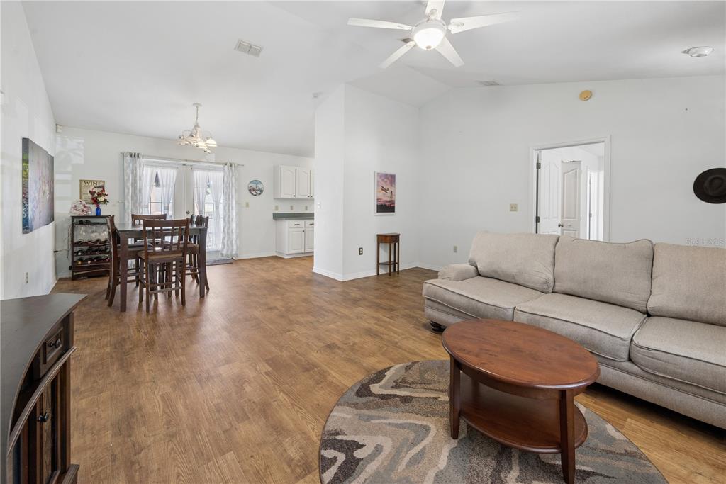 1750 Southwest 15th Street Bell, FL 32619 - Photo 6 of 34 a living room with furniture and wooden floor