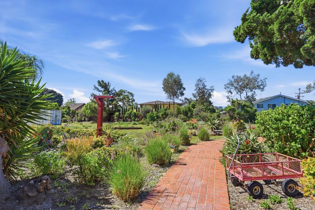 1355 Rainbow Ridge Lane Encinitas, CA 92024 - Photo 12 of 45 a view of a garden