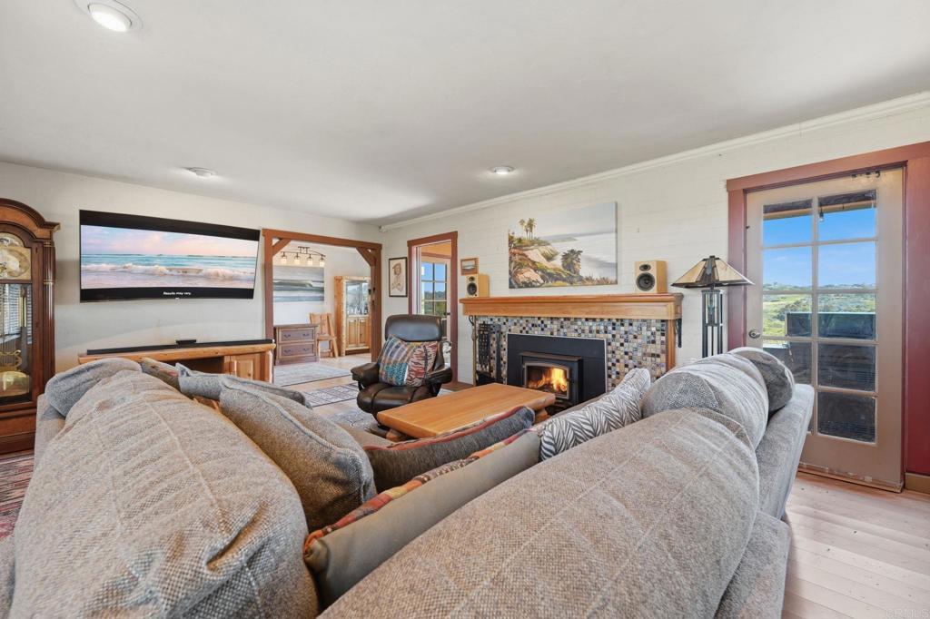 1355 Rainbow Ridge Lane Encinitas, CA 92024 - Photo 22 of 45 a bed room with two beds and a fireplace