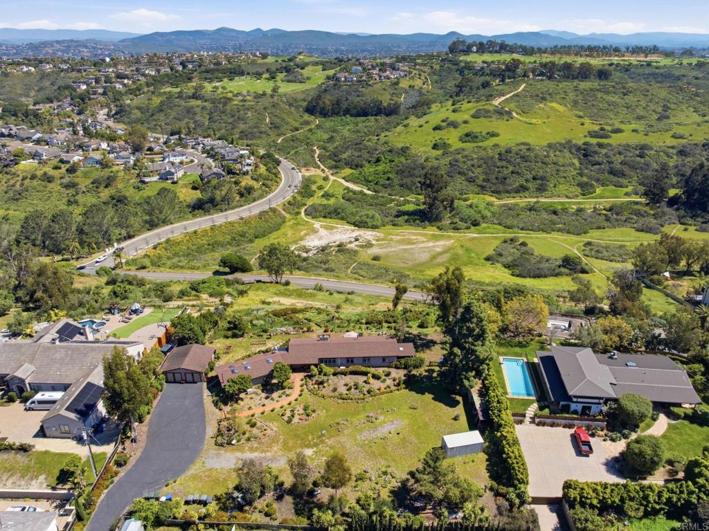 1355 Rainbow Ridge Lane Encinitas, CA 92024 - Photo 40 of 45 an aerial view of residential houses with outdoor space