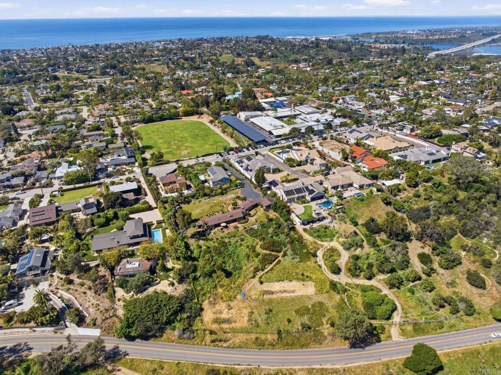 1355 Rainbow Ridge Lane Encinitas, CA 92024 - Photo 4 of 45 an aerial view of residential houses with outdoor space