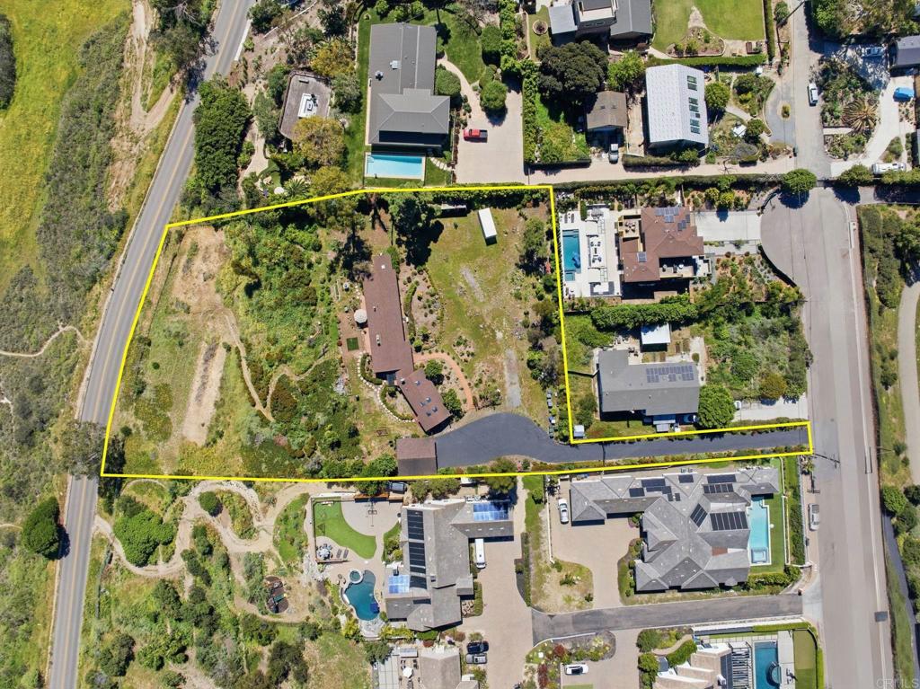 1355 Rainbow Ridge Lane Encinitas, CA 92024 - Photo 5 of 45 an aerial view of a houses with yard