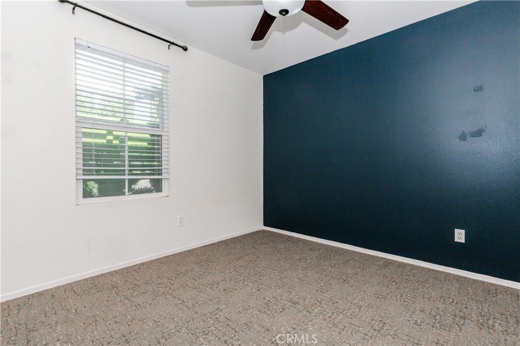1457 Faircliff Street Beaumont, CA 92223 - Photo 15 of 37 a view of an empty room with a window