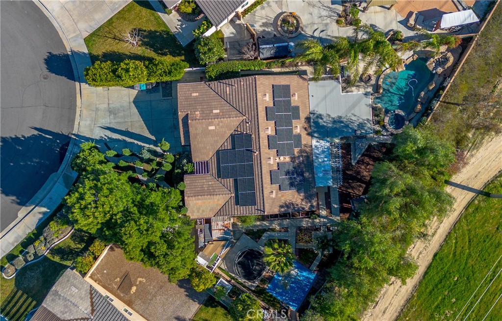 1457 Faircliff Street Beaumont, CA 92223 - Photo 2 of 37 an aerial view of a house with a yard and garden
