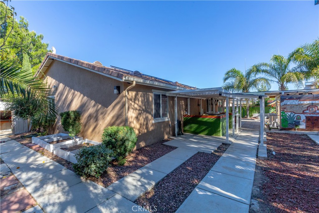 1457 Faircliff Street Beaumont, CA 92223 - Photo 29 of 37 a view of a house with a patio