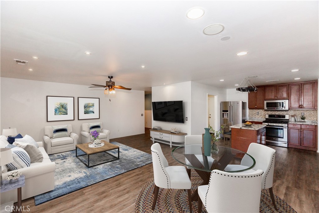 1457 Faircliff Street Beaumont, CA 92223 - Photo 5 of 37 a living room with furniture and a flat screen tv