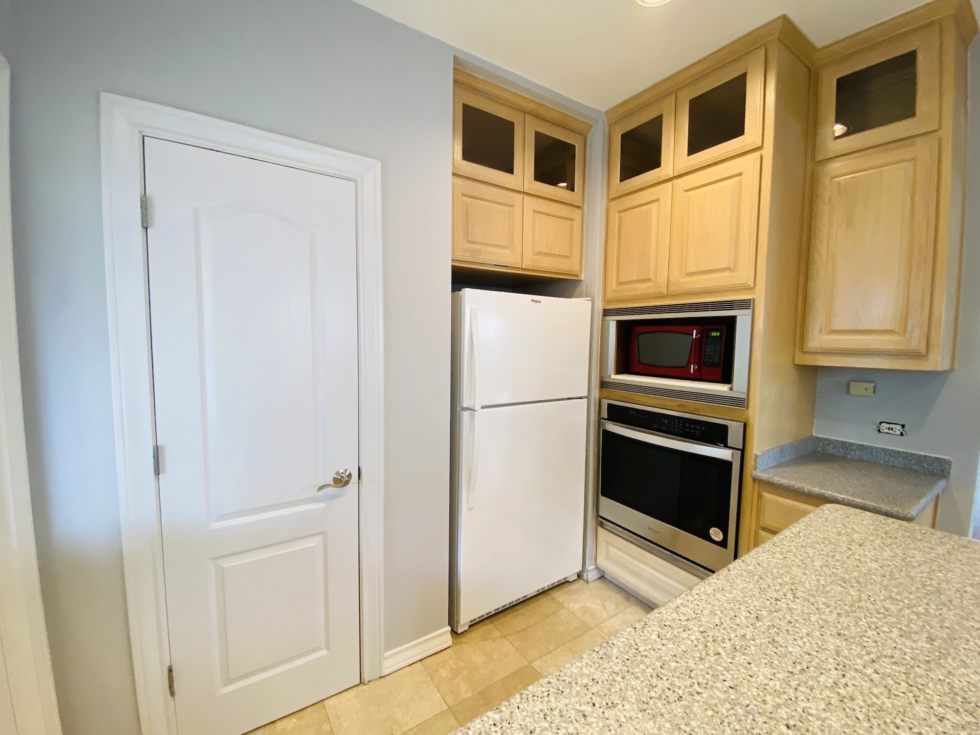 404 East 35th Street, Unit A Austin, TX 78705 - Photo 13 of 36 a view of kitchen with stainless steel appliances wooden cabinet and refrigerator