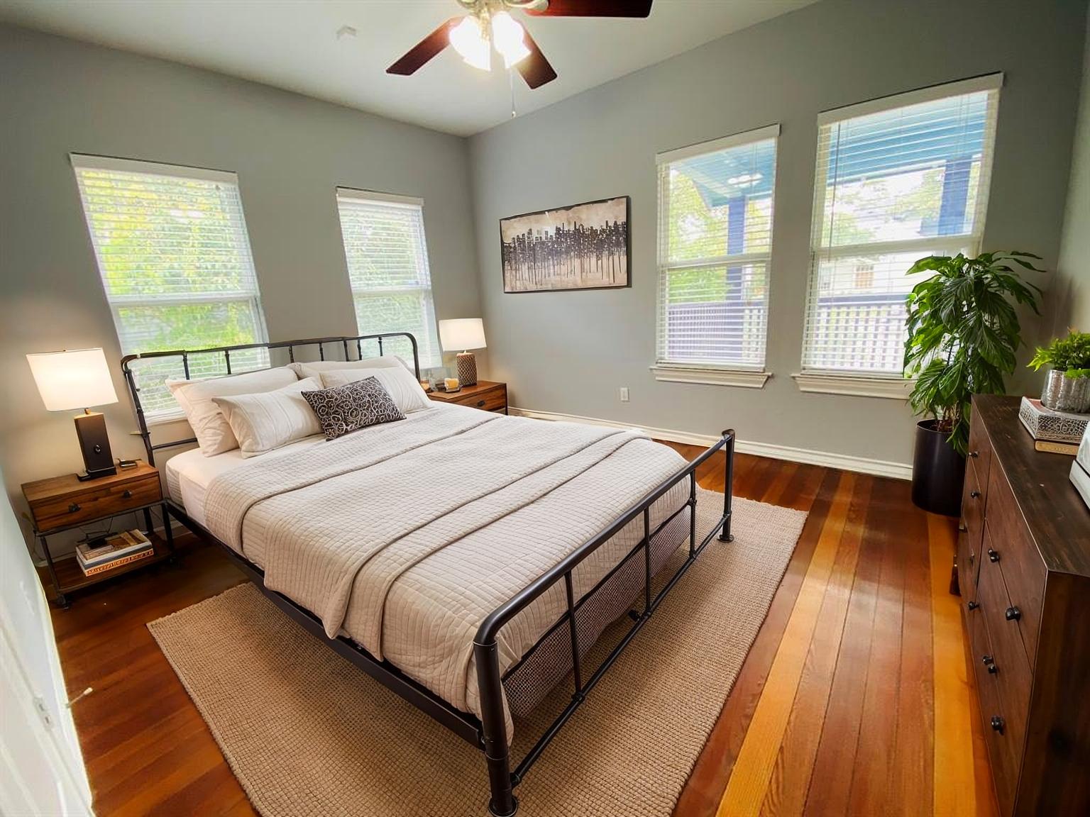 404 East 35th Street, Unit A Austin, TX 78705 - Photo 17 of 36 a bedroom with bed and a large window