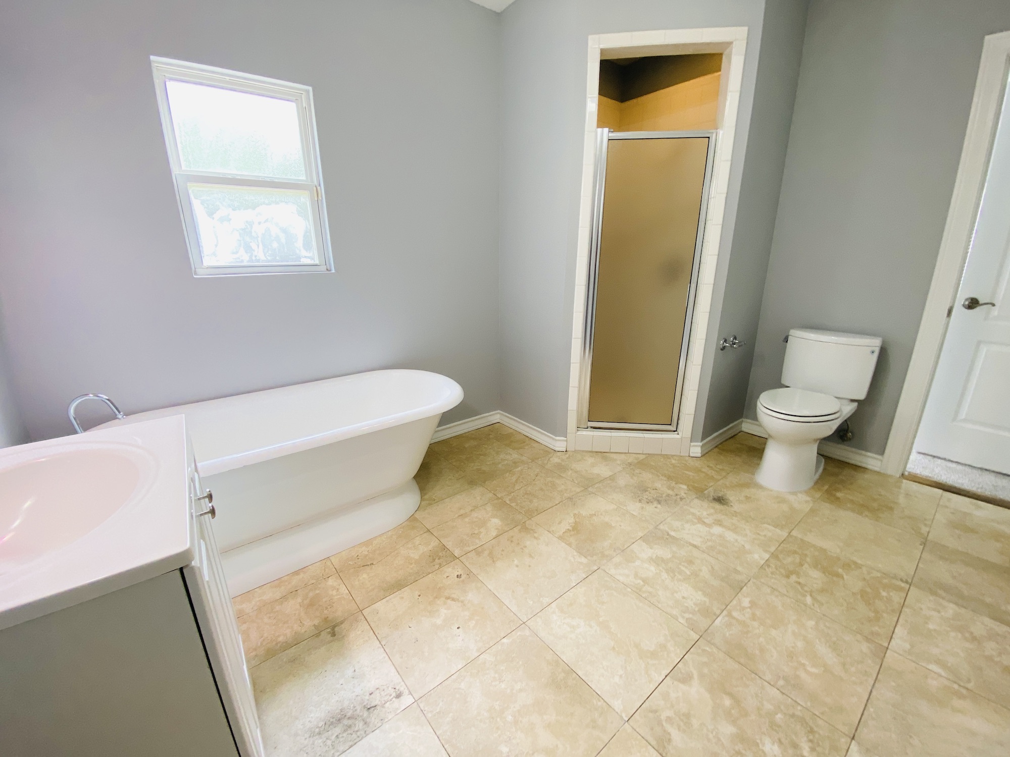 404 East 35th Street, Unit A Austin, TX 78705 - Photo 29 of 36 a bathroom with a toilet and a shower