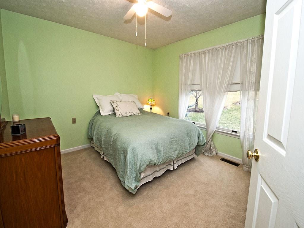 208 Ruth Way McDonald, PA 15057 - Photo 12 of 23 Bedroom #2 boasts a double window and ceiling fan.