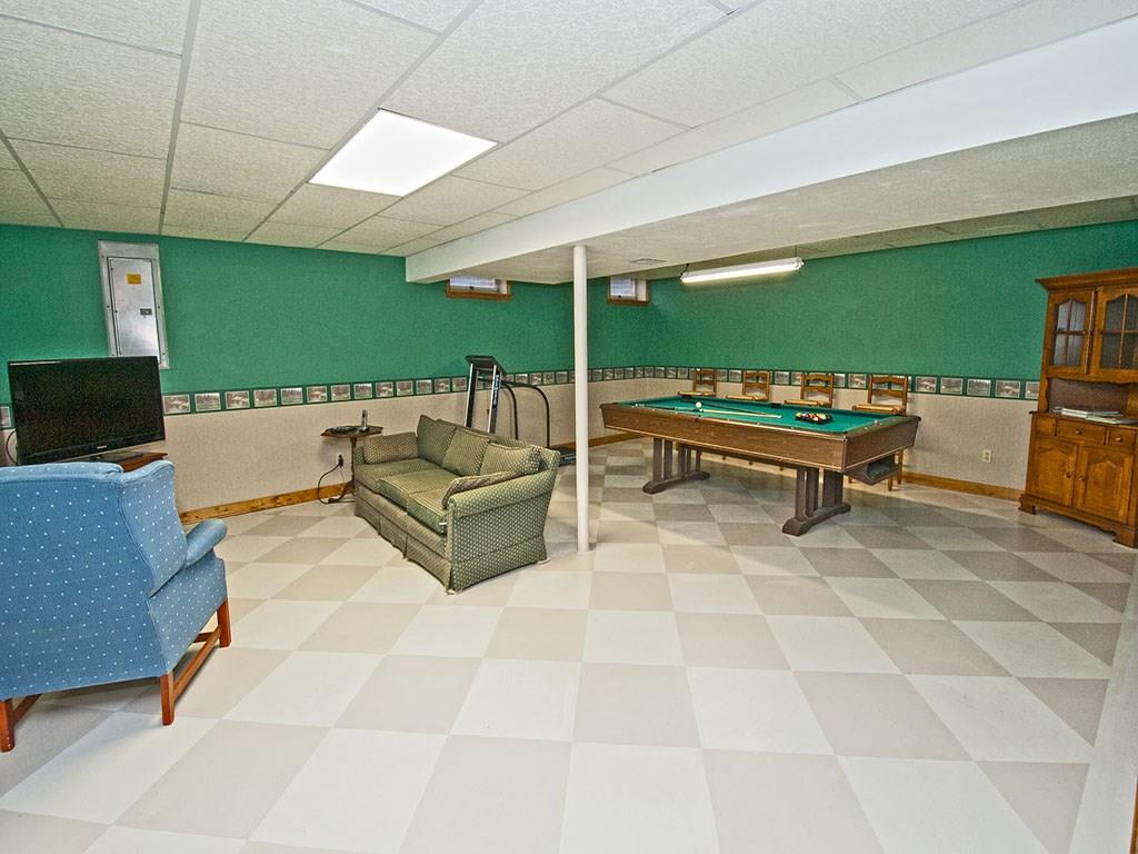 208 Ruth Way McDonald, PA 15057 - Photo 16 of 23 Finished lower level game room is ideal for all ages and uses. Plenty of space for games and entertaining.