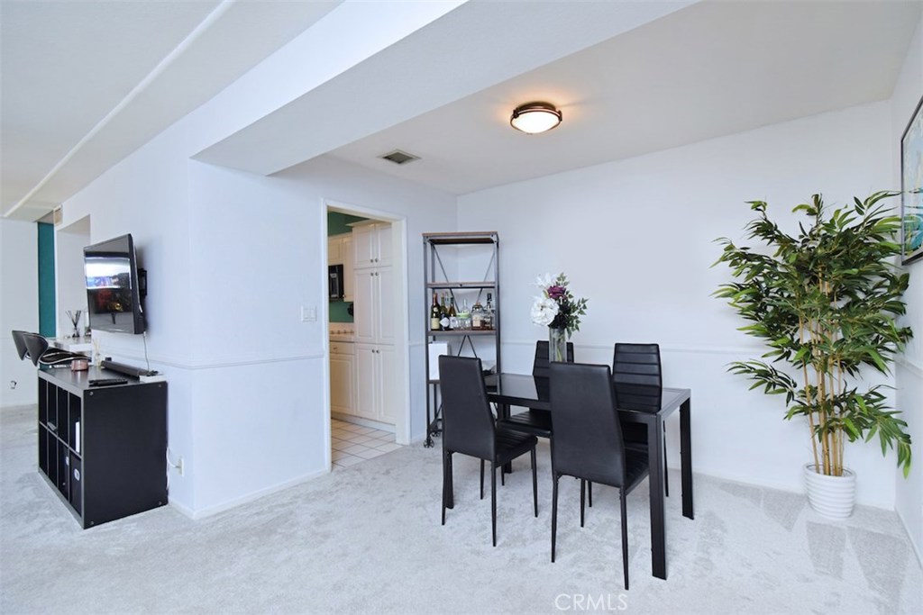 5050 Coldwater Canyon Avenue, Unit 306 Sherman Oaks, CA 91423 - Photo 16 of 24 a view of a workspace with furniture