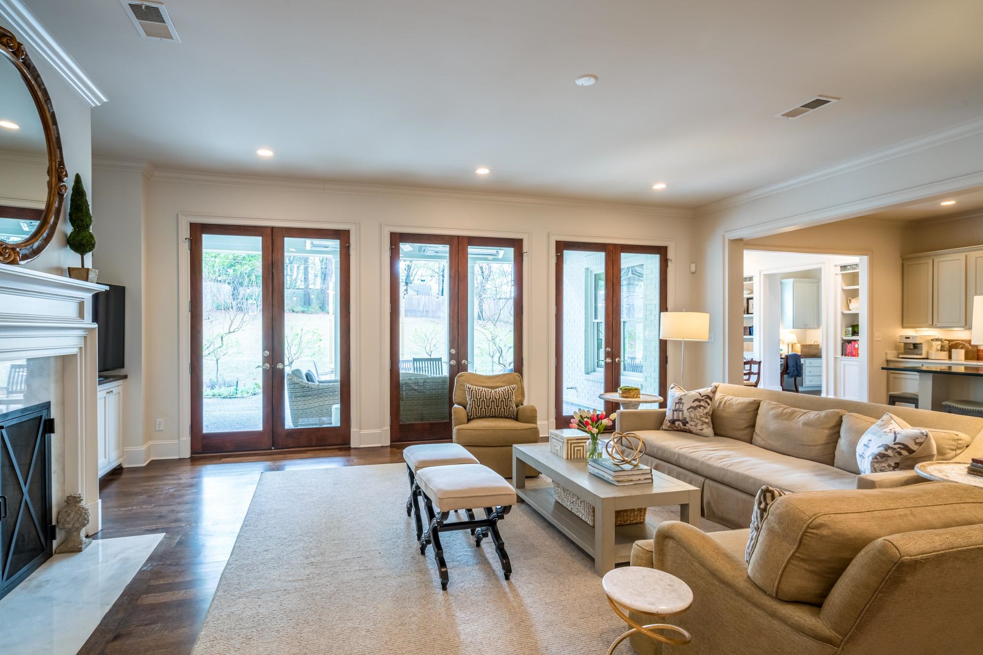 275 Barry Road Memphis, TN 38117 - Photo 12 of 25 a living room with furniture large window and wooden floor