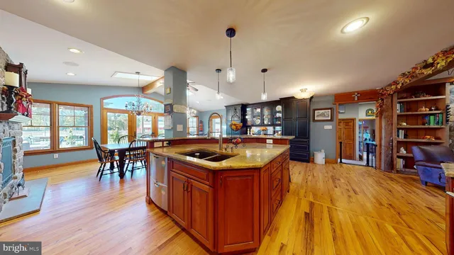 a view of entryway with wooden floor and stairs