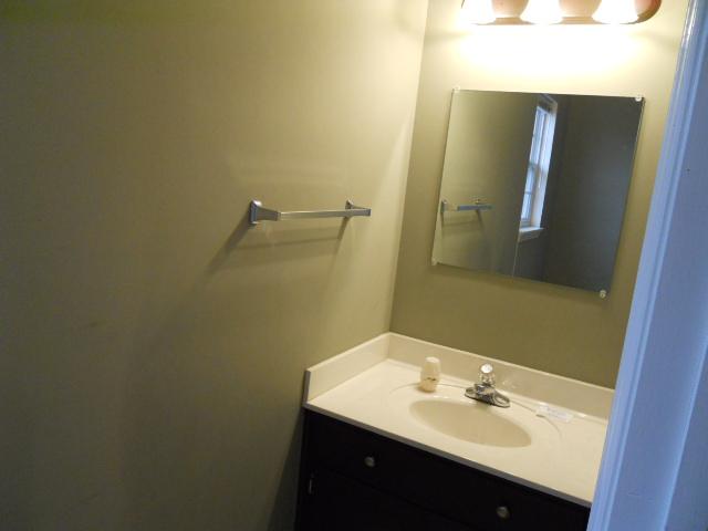 958 Rocky Valley Road Lebanon, TN 37090 - Photo 8 of 20 a bathroom with a sink and a mirror