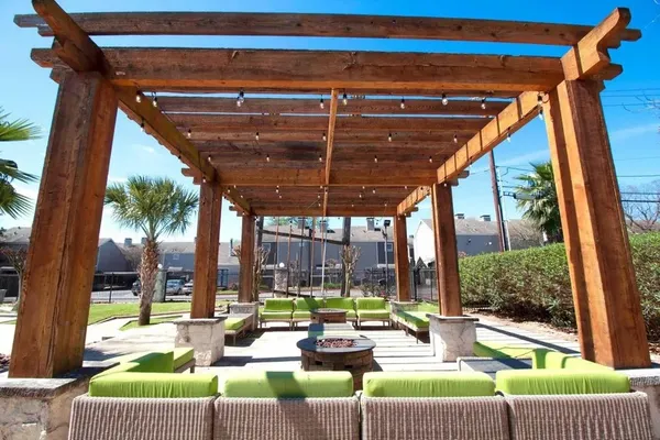 a view of a porch with seating space