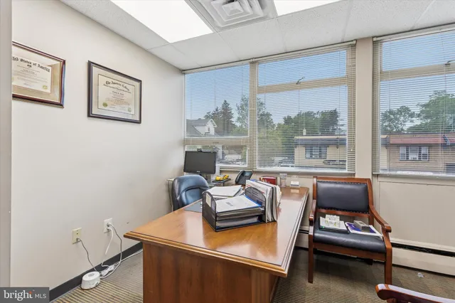 a kitchen with a stove and a refrigerator