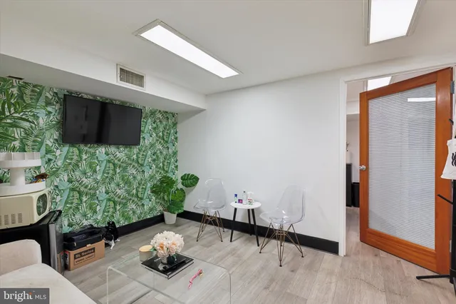 a children room with furniture and toys