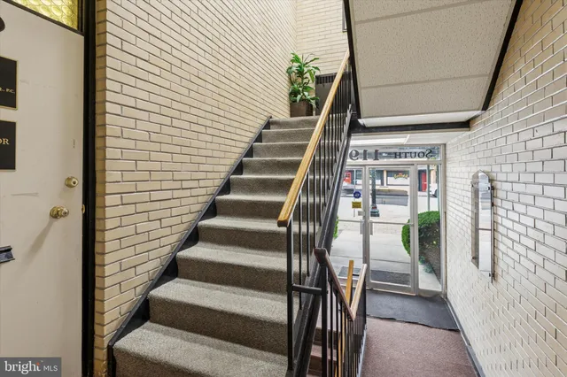 a view of a workspace with furniture