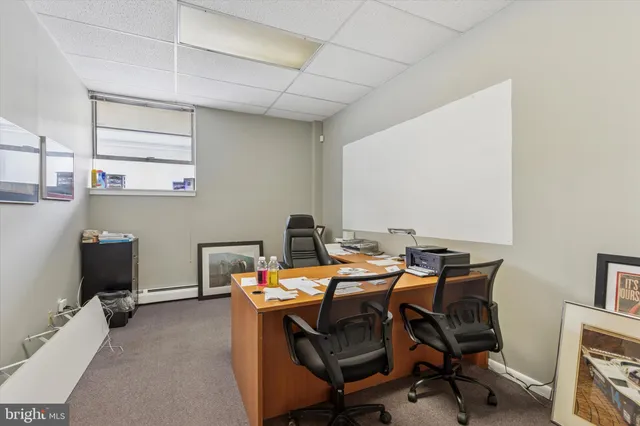 a room with a cabinets and a dresser