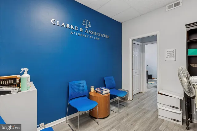 a view of entryway with wooden floor