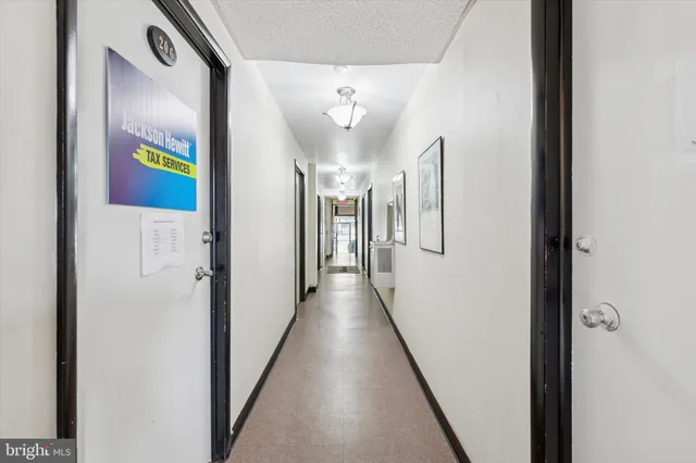 an aerial view of a residential houses with outdoor space