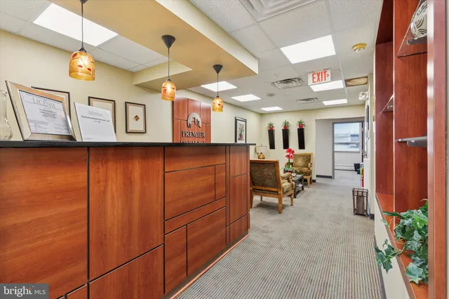 a living room with furniture a rug and a couch