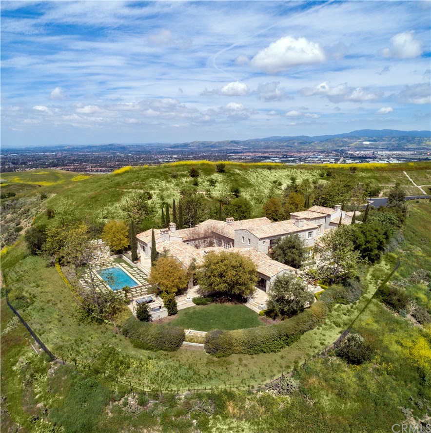 11 Needle Grass Irvine, CA 92603 - Photo 1 of 23 a view of lake with mountain