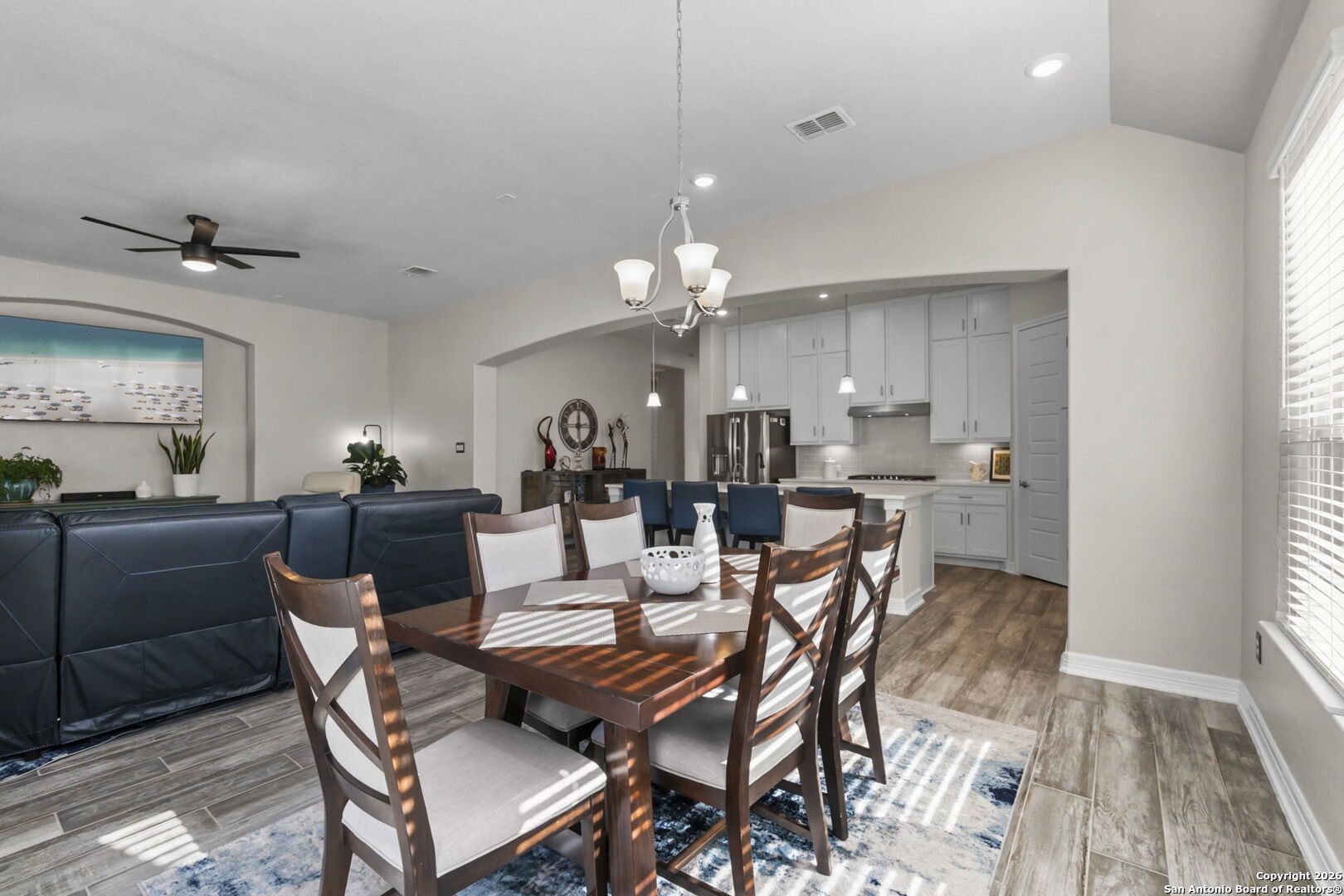 705 Tree Top Pass New Braunfels, TX 78130 - Photo 12 of 49 a view of a dining room with furniture