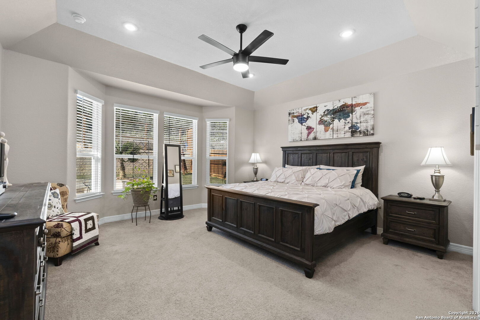 705 Tree Top Pass New Braunfels, TX 78130 - Photo 14 of 49 a bedroom with a bed and a large window