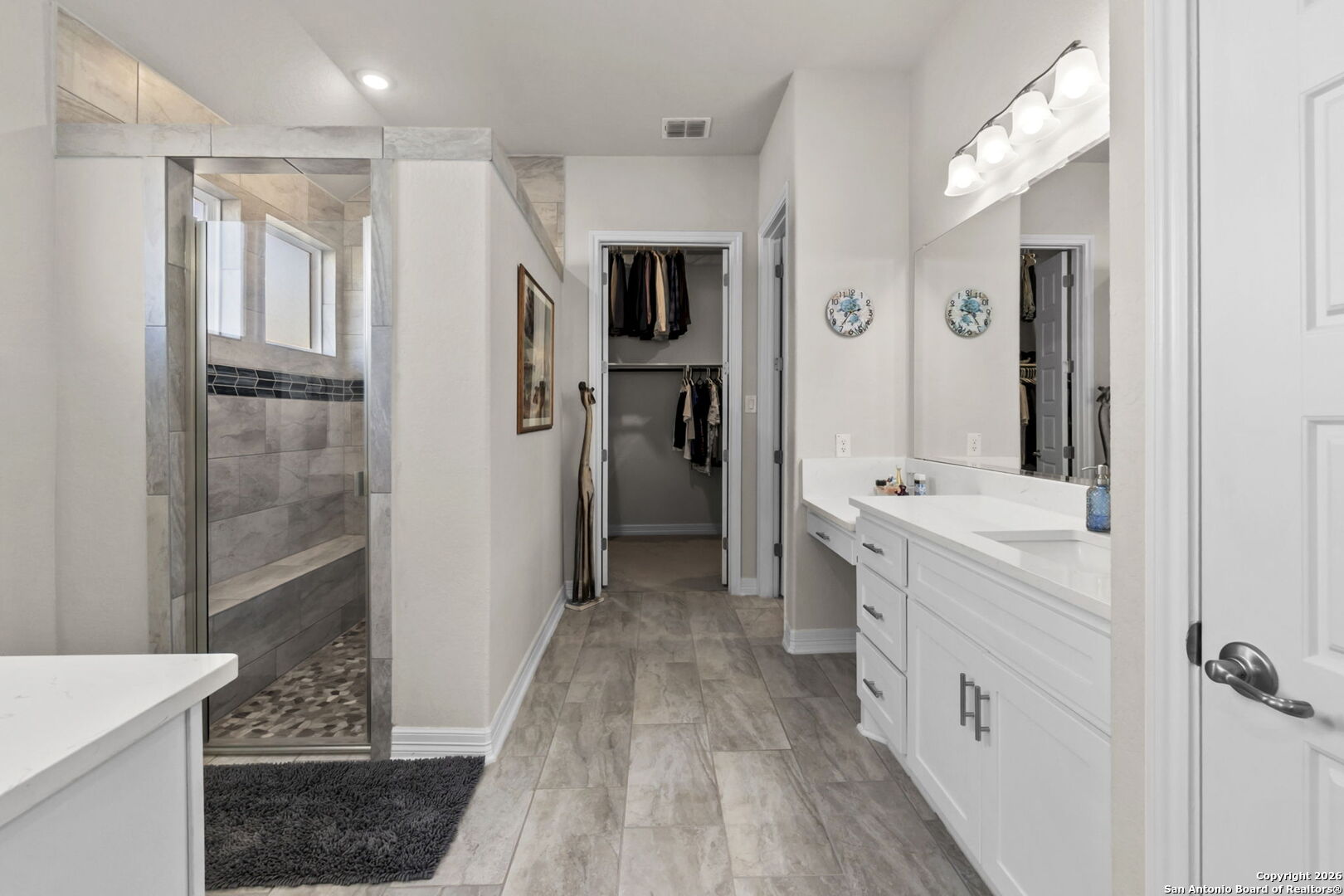 705 Tree Top Pass New Braunfels, TX 78130 - Photo 15 of 49 a bathroom with a sink a toilet and shower