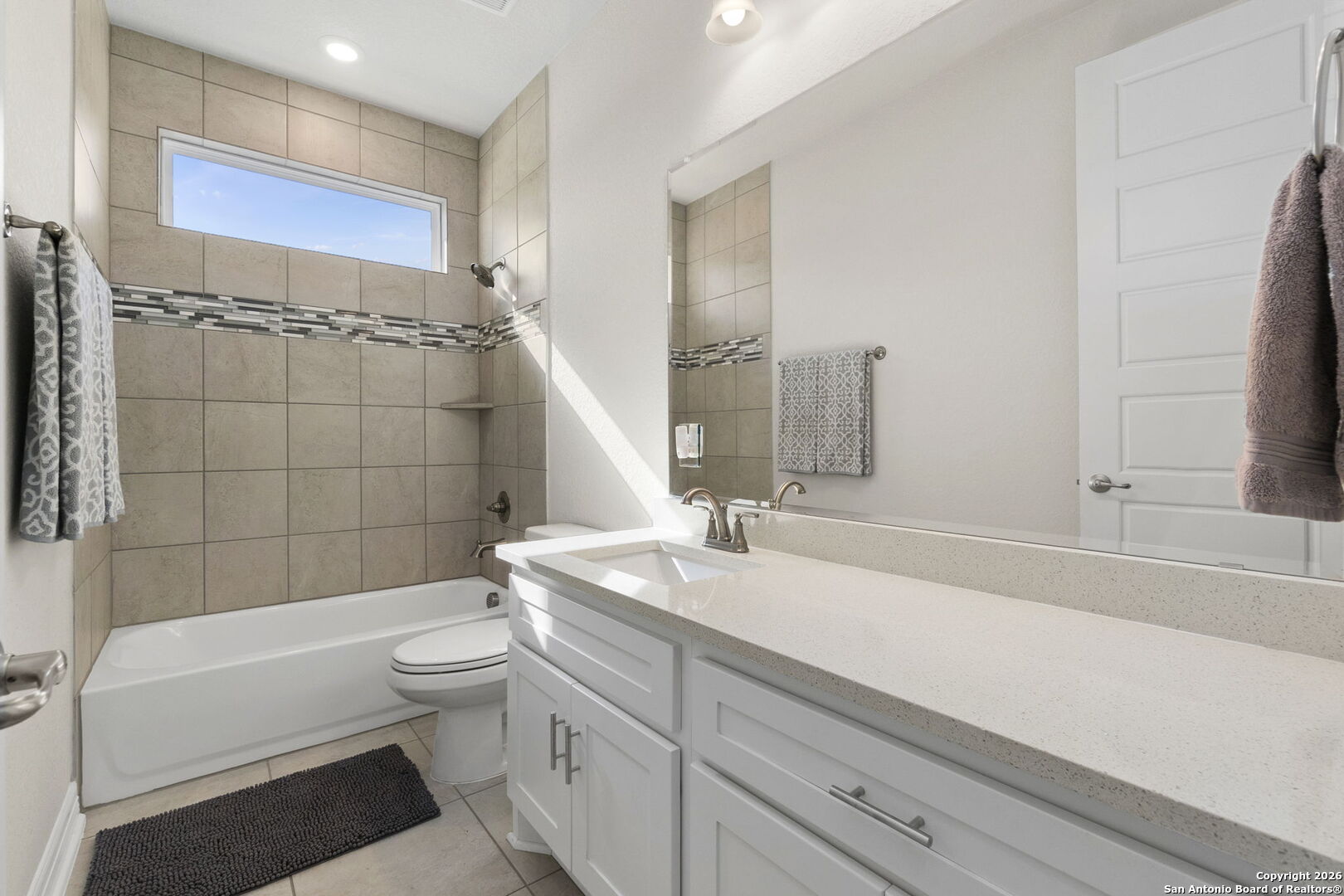 705 Tree Top Pass New Braunfels, TX 78130 - Photo 25 of 49 a bathroom with a sink a toilet and shower