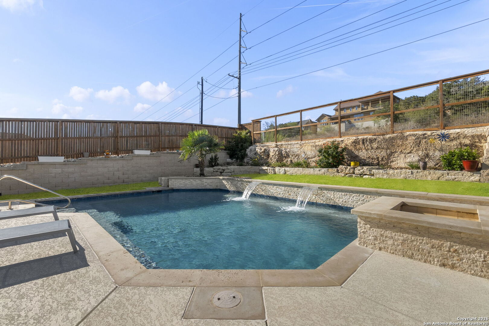 705 Tree Top Pass New Braunfels, TX 78130 - Photo 27 of 49 a view of a swimming pool with lawn chairs