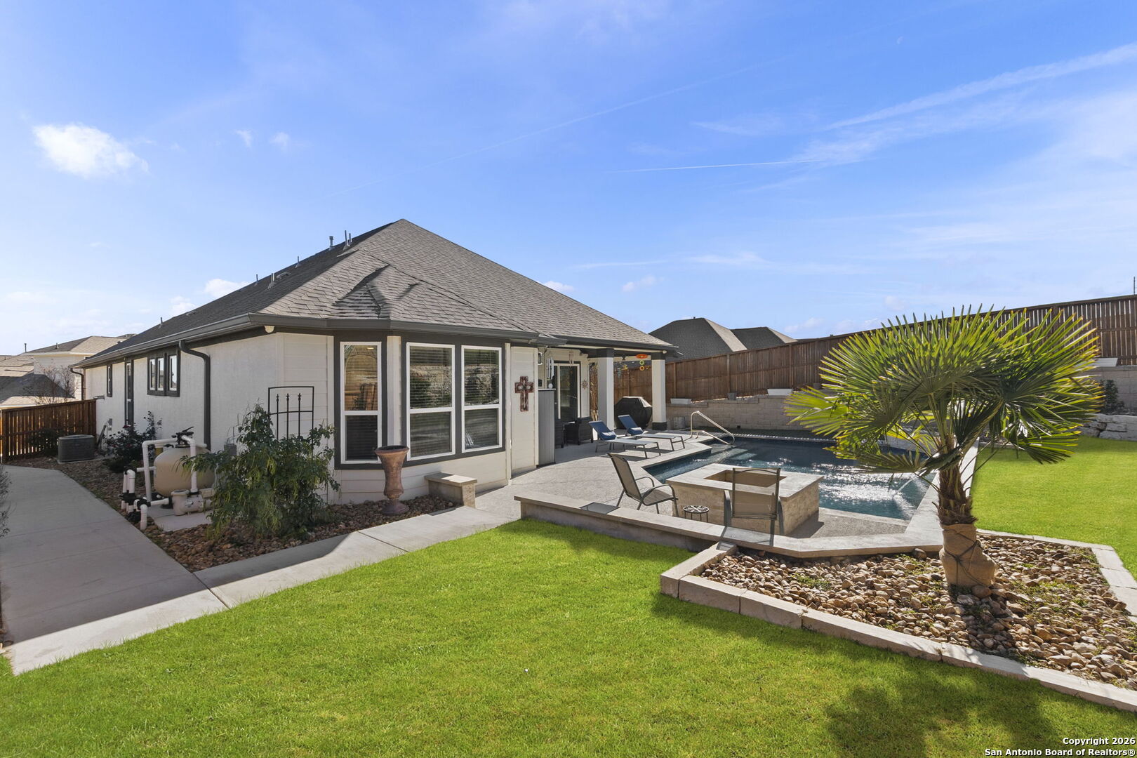 705 Tree Top Pass New Braunfels, TX 78130 - Photo 29 of 49 a front view of a house with garden