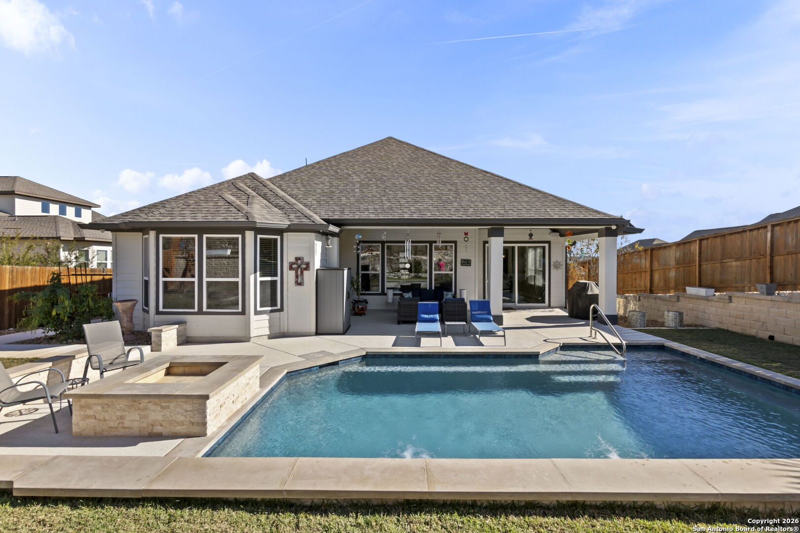 705 Tree Top Pass New Braunfels, TX 78130 - Photo 41 of 49 a view of a house with swimming pool and sitting area