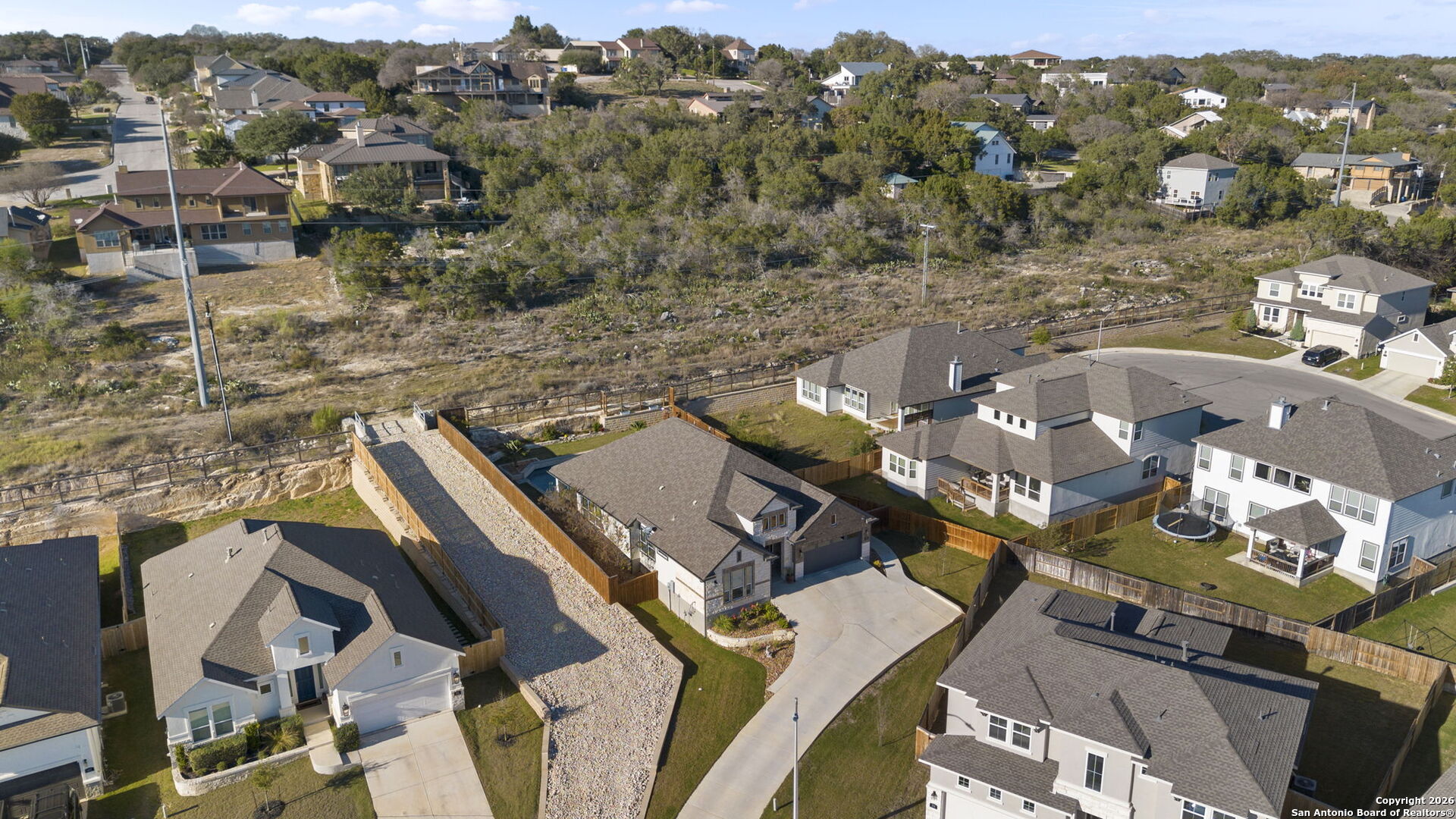 705 Tree Top Pass New Braunfels, TX 78130 - Photo 43 of 49 an aerial view of houses with yard