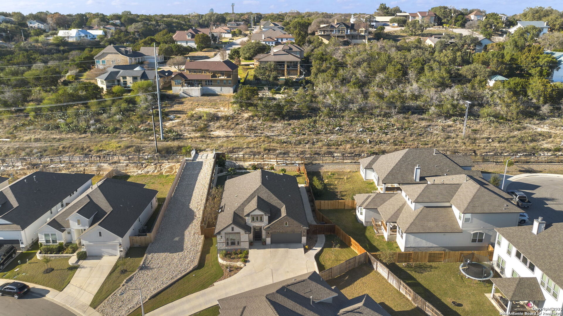 705 Tree Top Pass New Braunfels, TX 78130 - Photo 44 of 49 an aerial view of residential houses with outdoor space