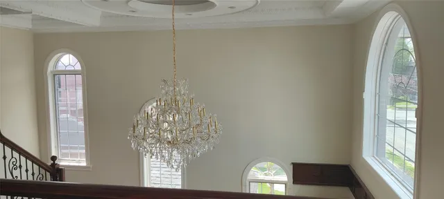 a view of a chandelier in a room