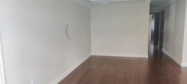 a view of small space with wooden floor