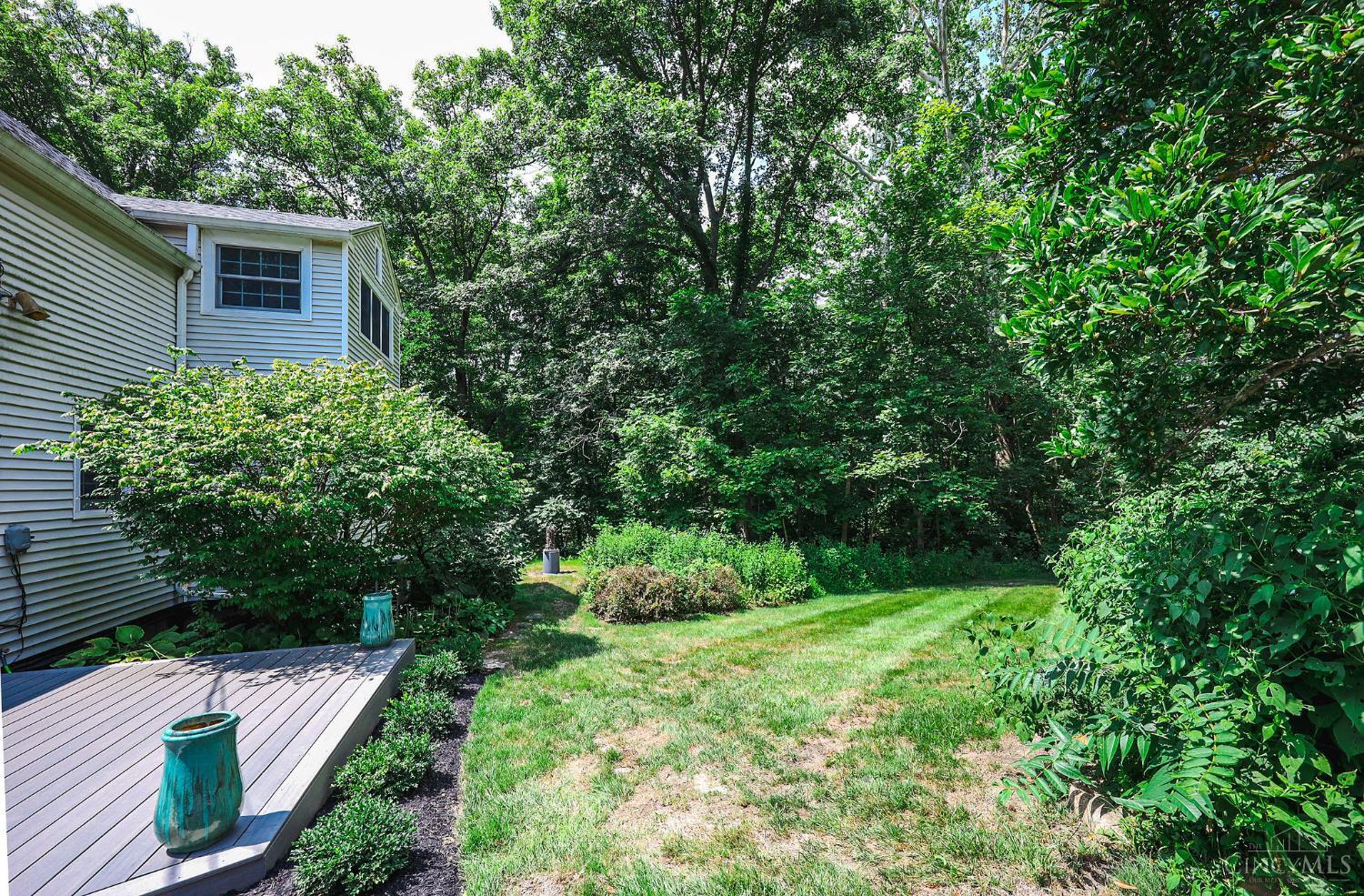 5115 Bonham Road Oxford, OH 45056 - Photo 21 of 24 Back Deck, Basement Access, Yard and many Hardwood Trees.