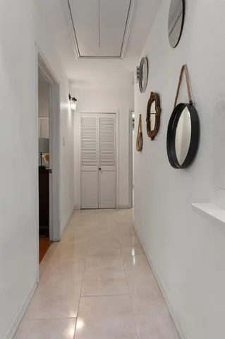 a view of a storage & utility room with racks on the wall