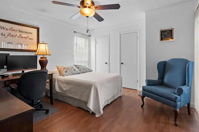 a bedroom with a bed and furniture