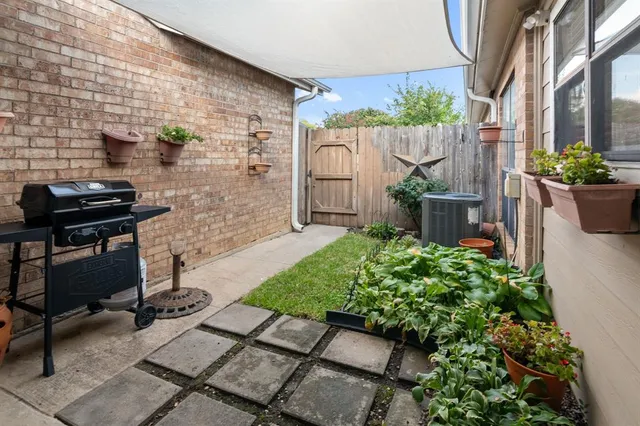 a view of yard with patio