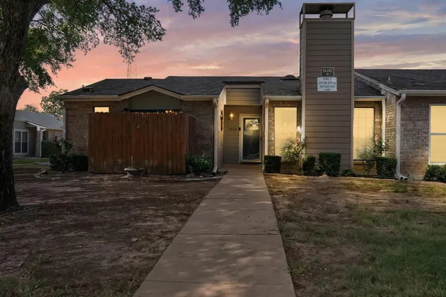 a front view of house with a yard