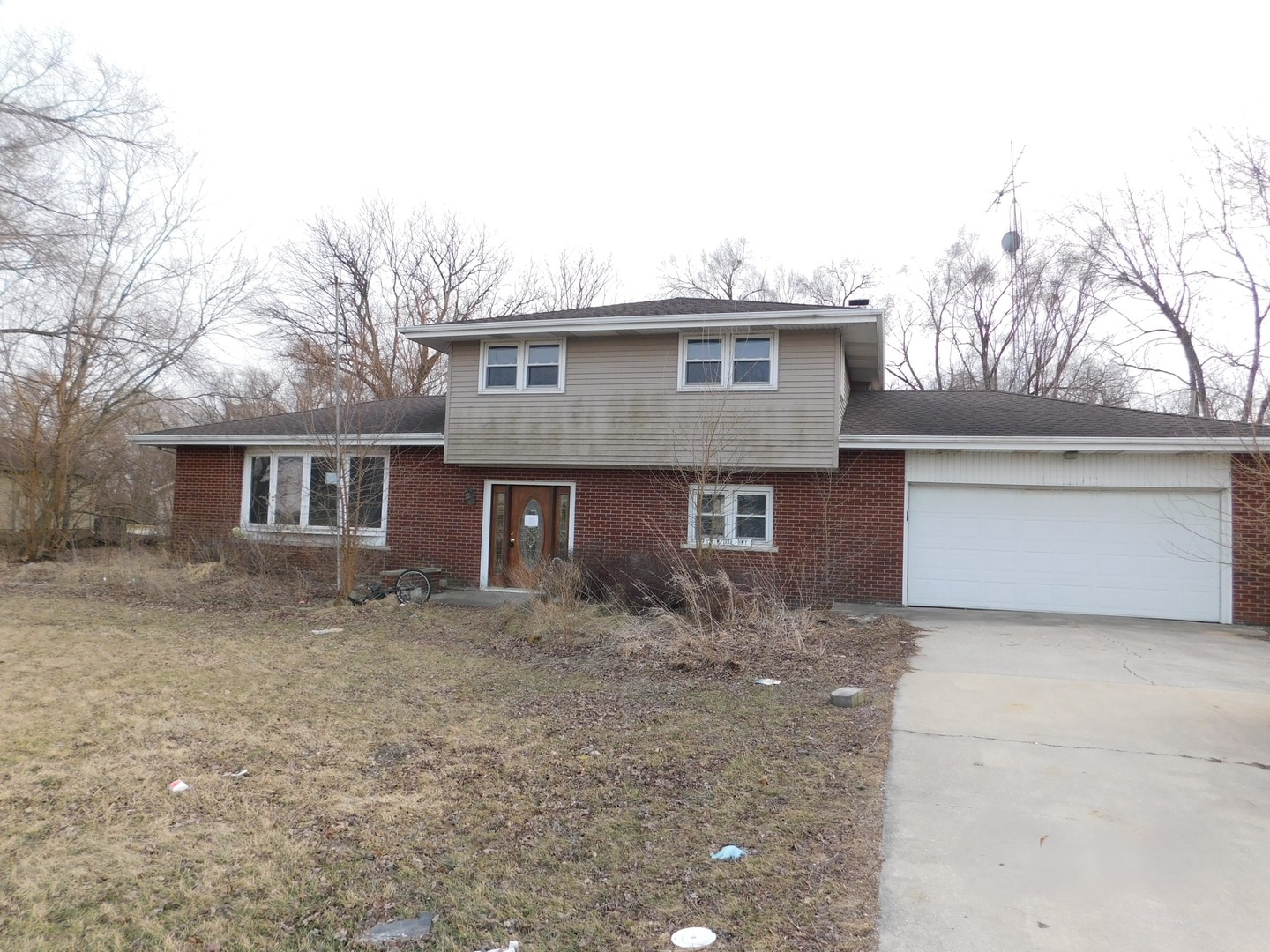 a front view of a house with yard