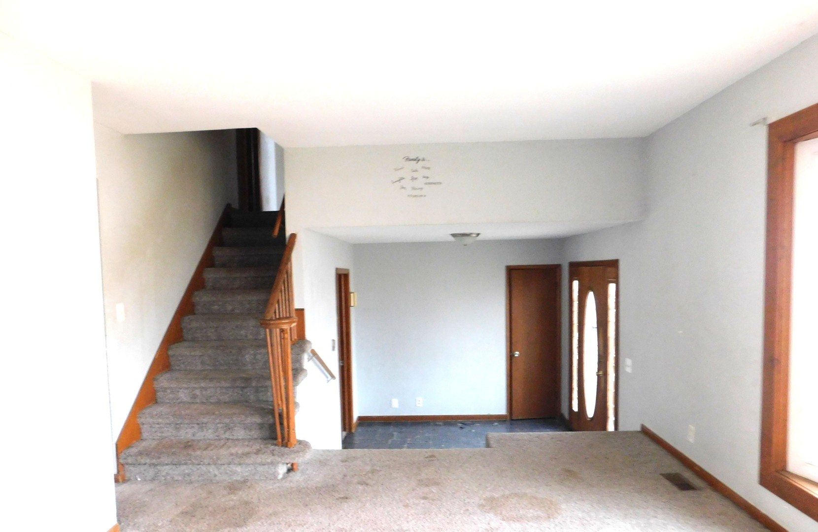 150 South Dixie Highway St. Anne, IL 60964 - Photo 3 of 15 a view of entryway with a hallway