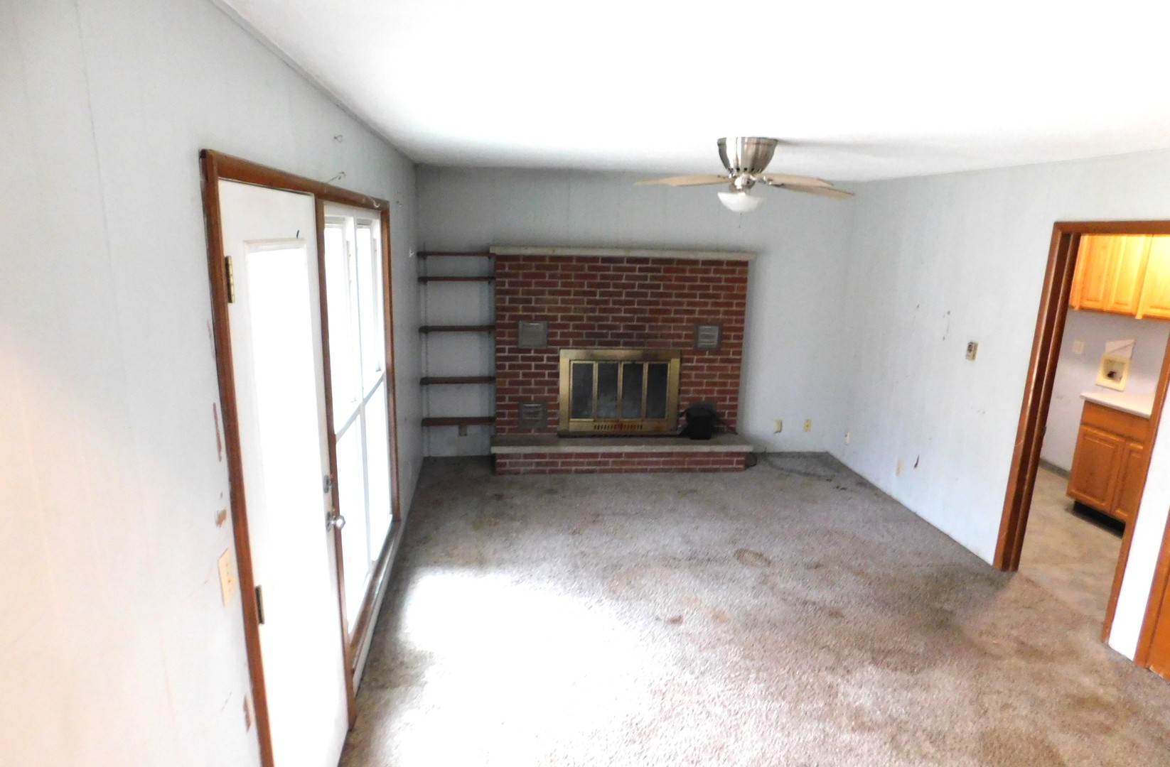 150 South Dixie Highway St. Anne, IL 60964 - Photo 7 of 15 a view of empty room with a fireplace
